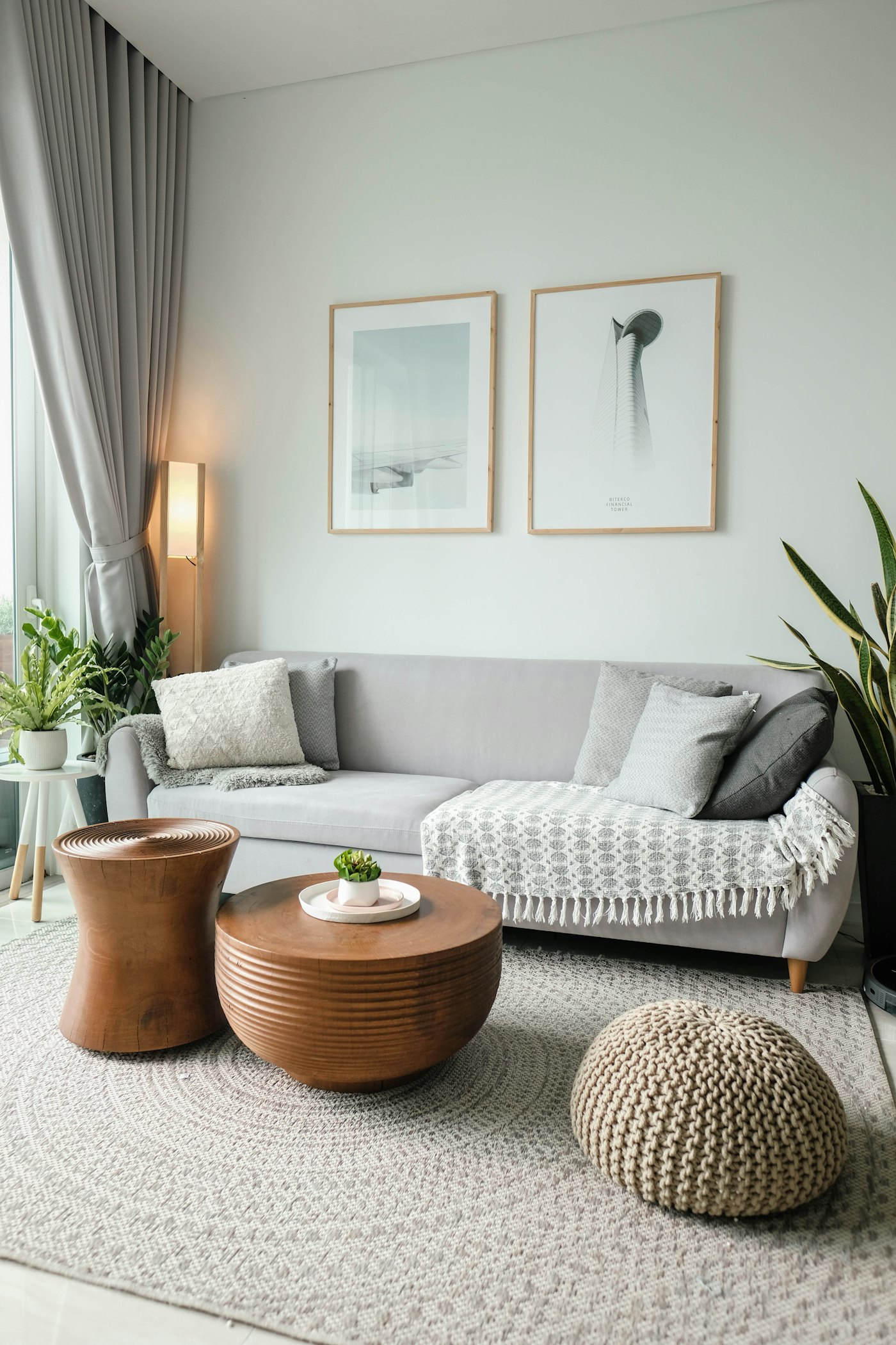 Soft neutral living room with rattan mirrors